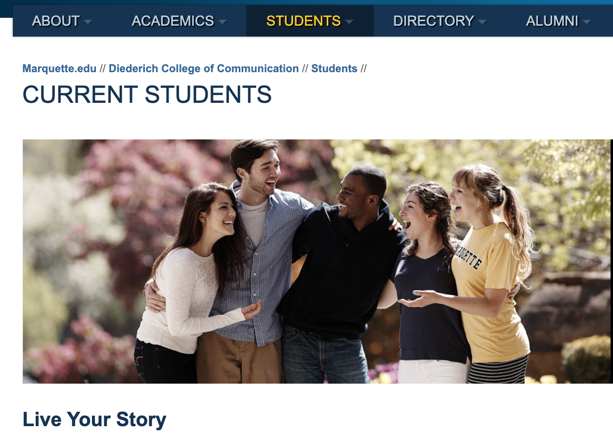 students of Marquette University smiling and enjoying the outdoors